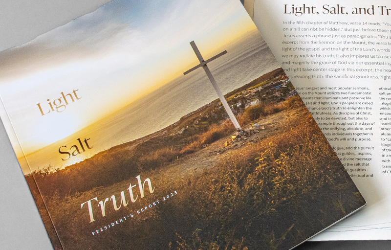 President's Report Cover with cross