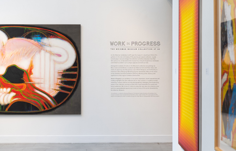 Wall graphics with art on the walls nearby
